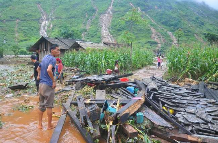 15 dead in Vietnam flash floods, landslides