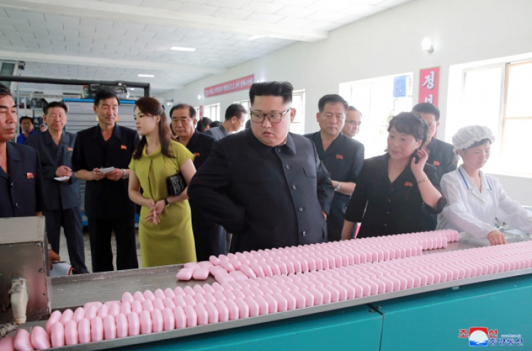 Kim Jong-un’s cosmetic factory visit raises prospect of enhanced economic ties with China