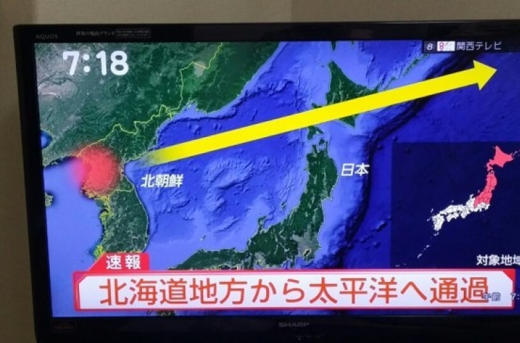 Japan eases North Korea missile alert system: report