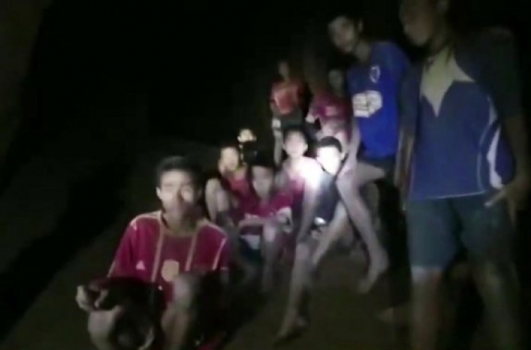 Thai rescuers find missing boys and coach alive in cave
