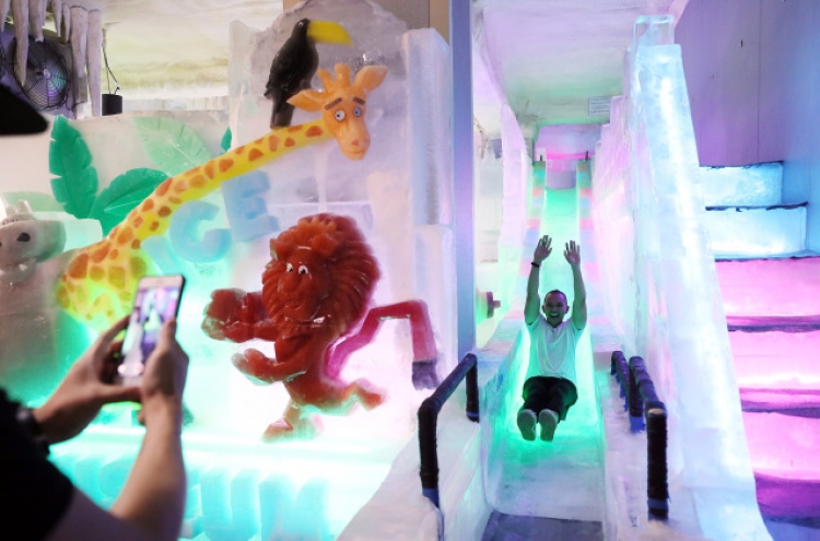 [Photo News] Feeling the heat? Stay cool at Hongdae’s Ice Museum