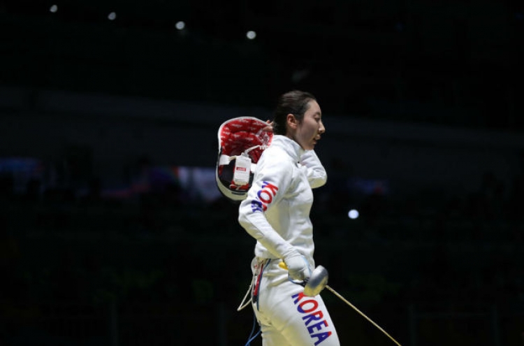 Star-crossed fencer finally puts Olympic controversy behind