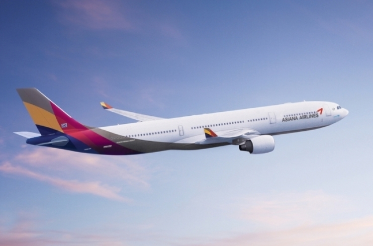 Asiana to cut back on flights to prevent delays