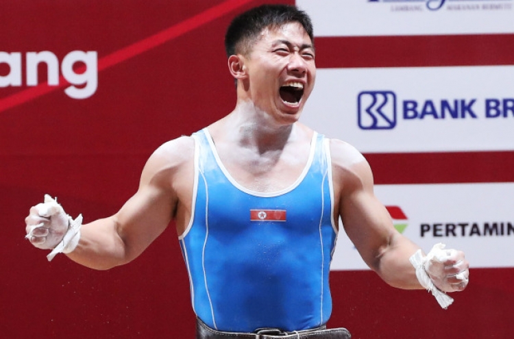 North Korea's O Kang-chol wins gold in men's 69kg weightlifting