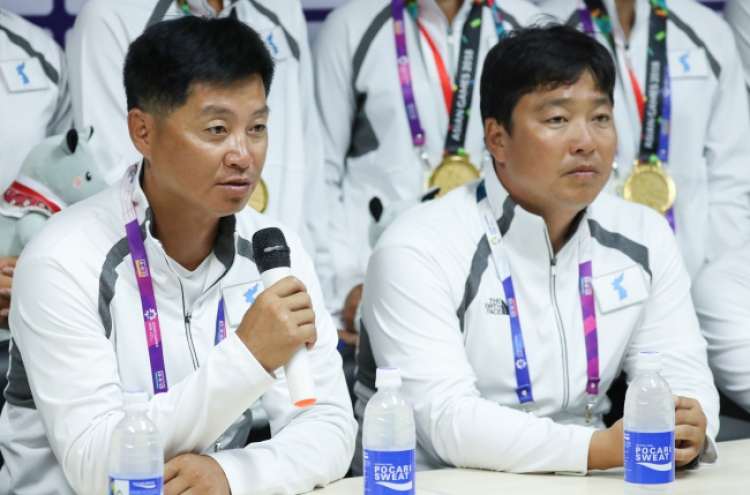 Coaches of unified Korean canoeing team hail athletes' grit for historic gold