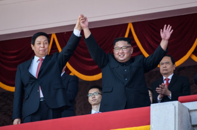 No ICBM, Kim speech at North Korea military parade