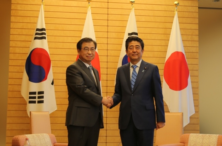 S. Korean spy agency chief briefs Abe on N. Korea trip