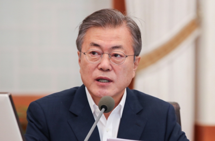 Moon calls on opposition parties to drop partisan politics