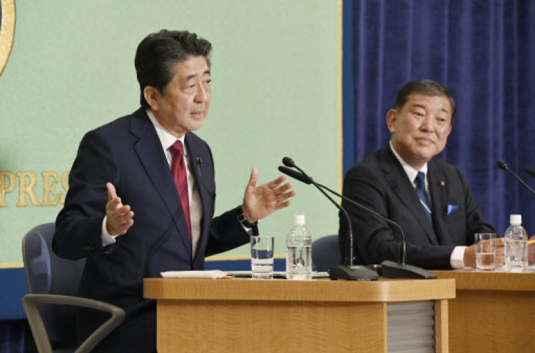 Abe aims to rewrite Japan constitution as he seeks 3rd term