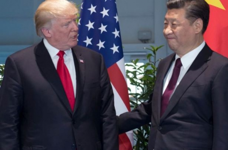 China announces tariff cut but no action on US complaints
