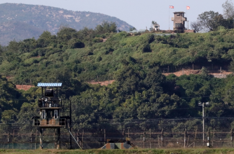 Two Koreas begin removing landmines inside DMZ