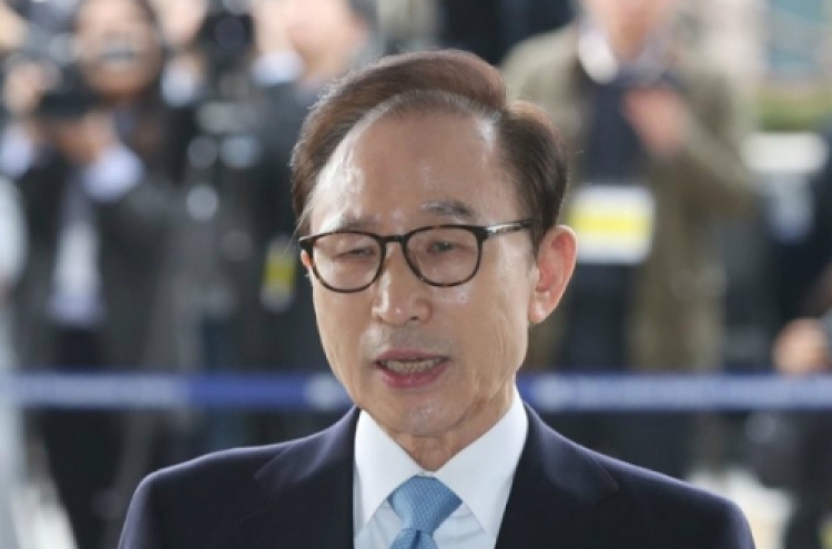 Court set to deliver ruling on corruption charges faced by ex-President Lee