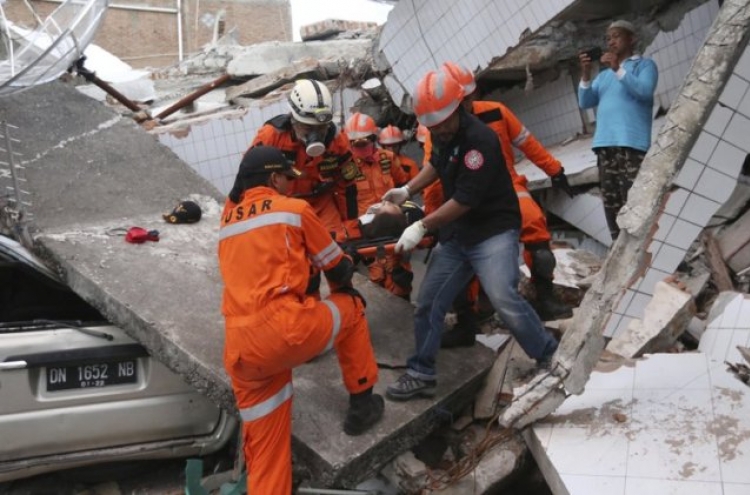 Many loved ones lost and uncounted in Indonesian disasters