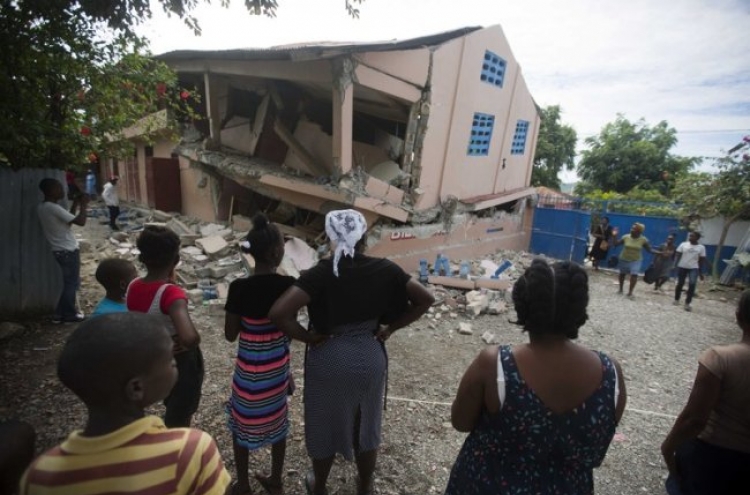 Strong aftershock rattles north Haiti day after deadly quake