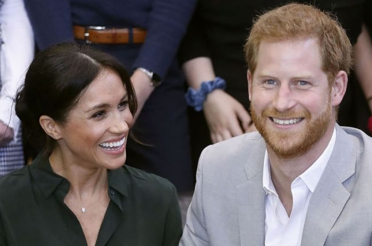 Prince Harry and Meghan expecting their 1st child in spring