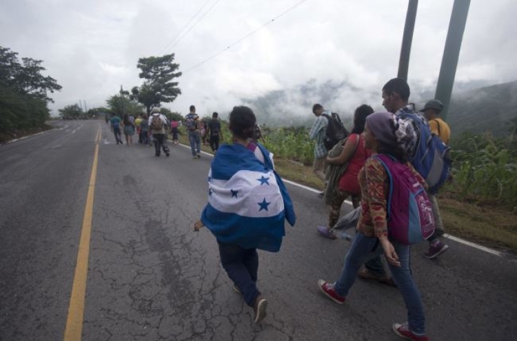 Migrants moving again in Guatemala, Trump targets Democrats