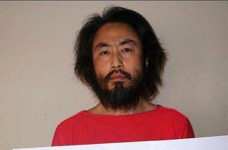 Japan journalist freed from Syrian captivity says he’s safe