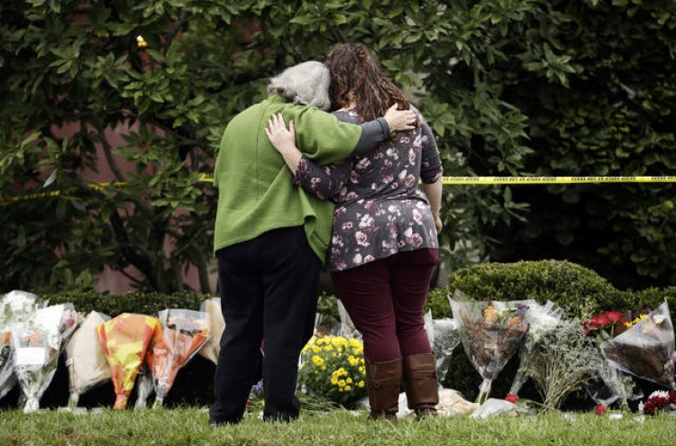 Survivor of synagogue massacre recounts moments of terror