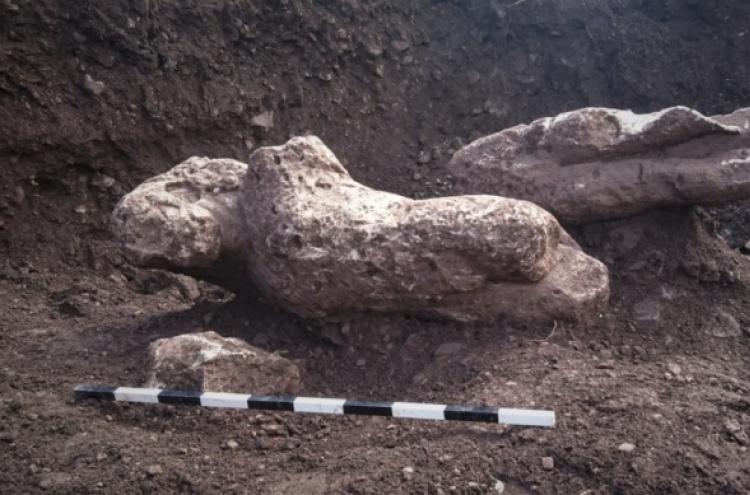 More ancient statues, graves unearthed in a Greek field