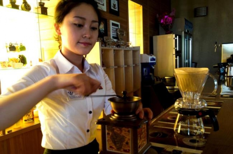 [Newsmaker] Ordinary North Koreans join elite in acquiring taste for coffee