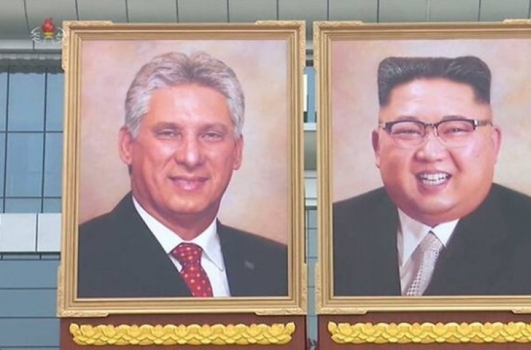 N. Korean leader's first painted portrait displayed at airport