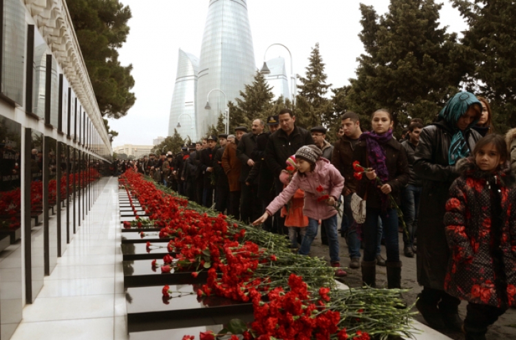 Azerbaijan honors dead in independence struggle