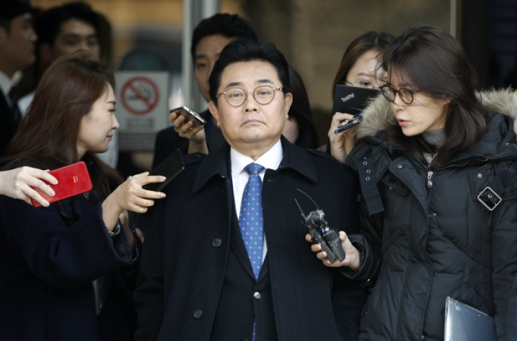 Ex-Moon aide handed 6-year jail term for graft, avoids being arrested