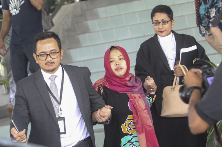 Malaysia court frees woman in North Korea murder case