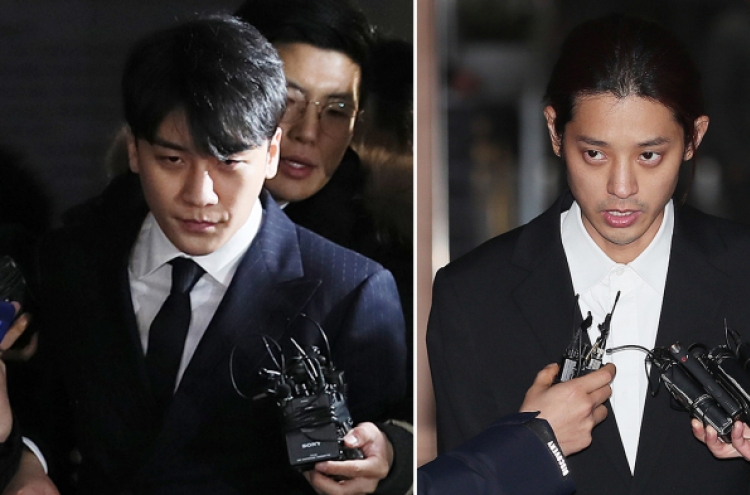 Seungri, Jung Joon-young return home after questioning over sex scandals