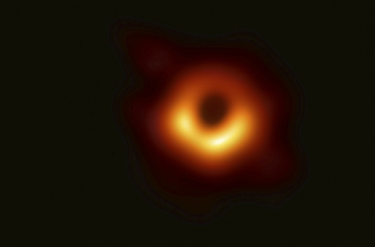 Astronomers unveil the first photo of a black hole