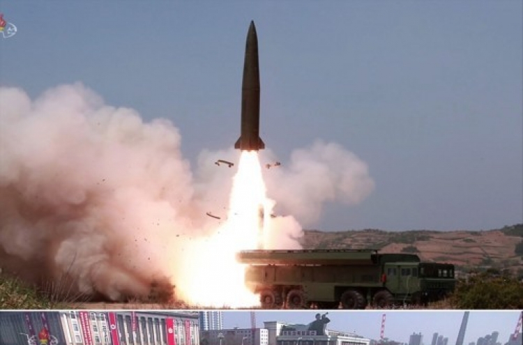 Spy agency says N. Korea's firing of projectiles "not provocative"