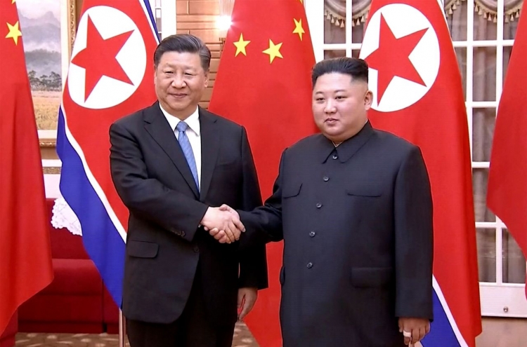 In summit with Kim, Xi vows active role in NK security, Korean Peninsula issues