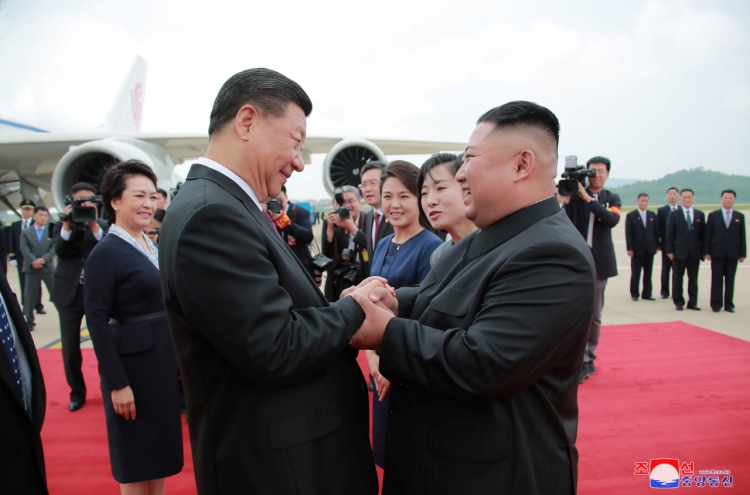 Kim, Xi agree to strengthen ties for regional peace, stability: KCNA