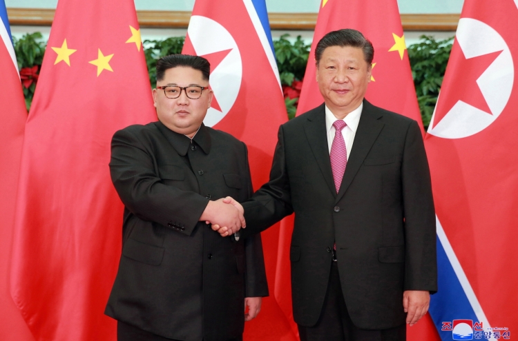 Kim, Xi agree to expand ties whatever external situation: NK media