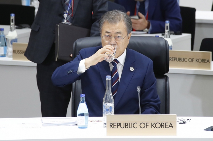 Moon ends Osaka trip, set for talks with Trump
