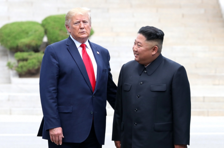Trump, Kim agree to resume nuclear talks at historic DMZ meeting