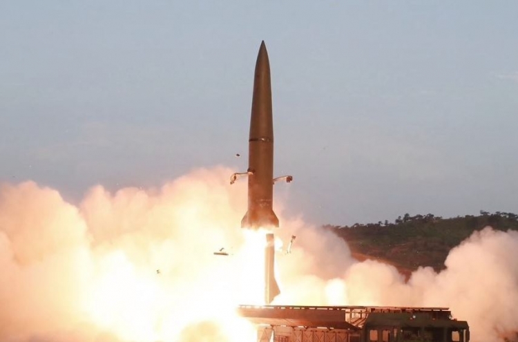 NK test-fired new rocket system under leader's supervision: state media