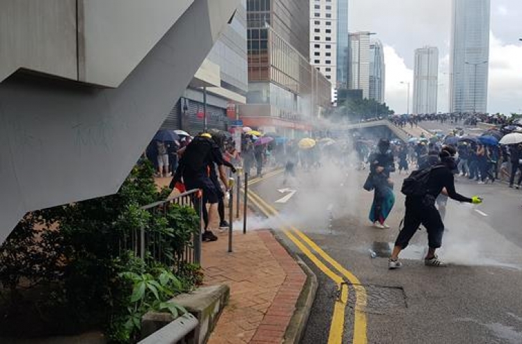 Fire, tear gas and petrol bombs as Hong Kong engulfed by chaos