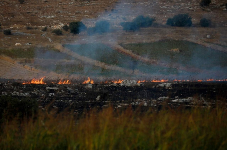 Israel, Hezbollah exchange fire after week of tensions