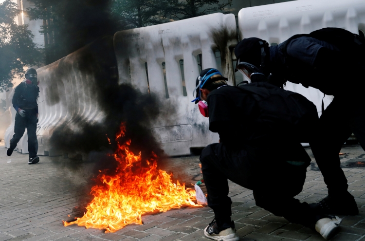 Violence flares after Hong Kong protesters defy police ban