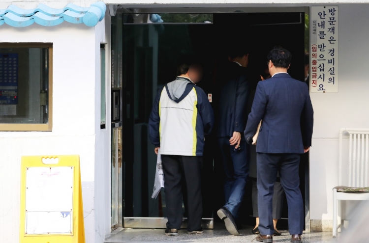 Prosecution raids justice minister's house over corruption scandal