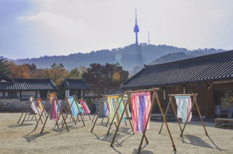 Namsangol Hanok Village incorporates modern artifacts inspired by Korean traditional themes