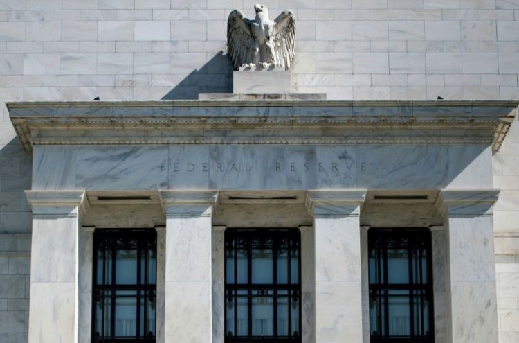 US Fed says will focus on low inflation, global economy