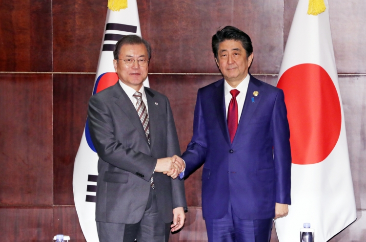 Seoul, Tokyo remain apart on forced labor issue, but stress dialogue at summit