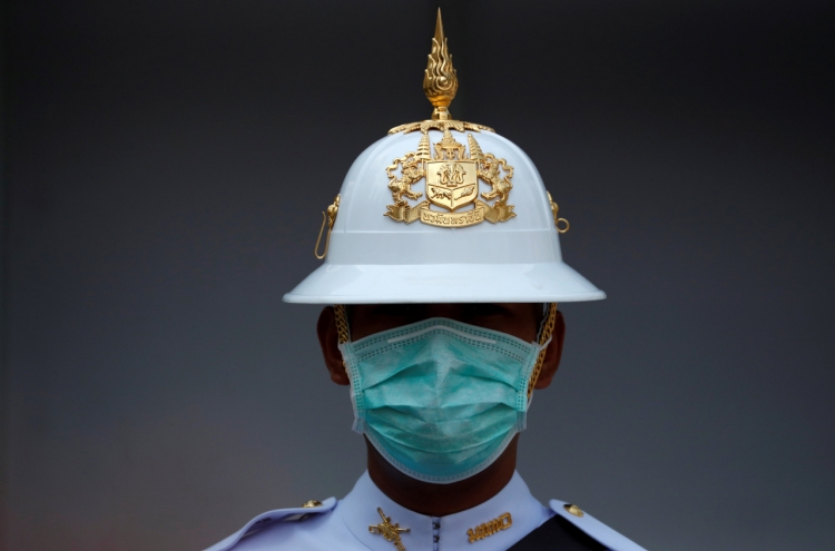 Thailand yields to virus fears, bars docking of cruise ship