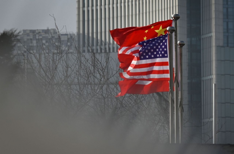 China revokes 3 Wall Street Journal reporters' credentials