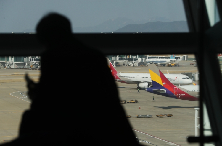[Newsmaker] Asiana flight turns back en route to Vietnam on coronavirus