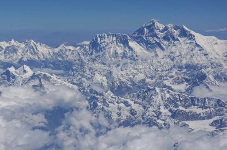 Pandemic shuts down Everest as Nepal suspends permits