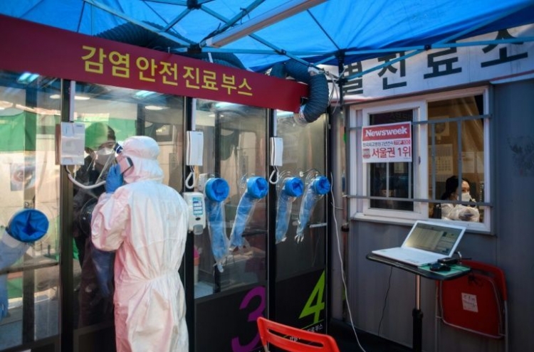 S. Korea dials up virus testing with hospital 'phone booths'