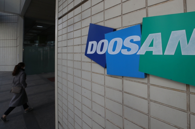 Doosan Group execs to forgo 30% of their wages